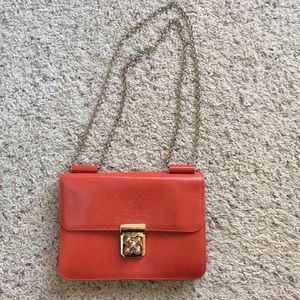 Red leather shoulder/cross body bag w gold chain